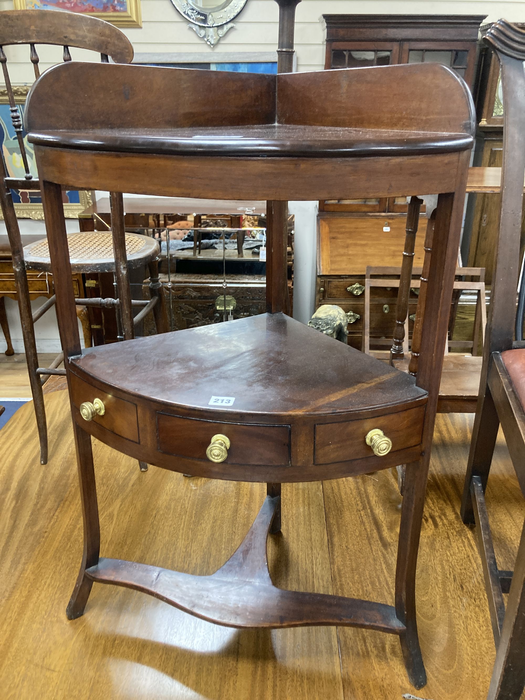 A George III mahogany corner washstand, width 55cm, depth 37cm, height 90cm, together with a dining chair